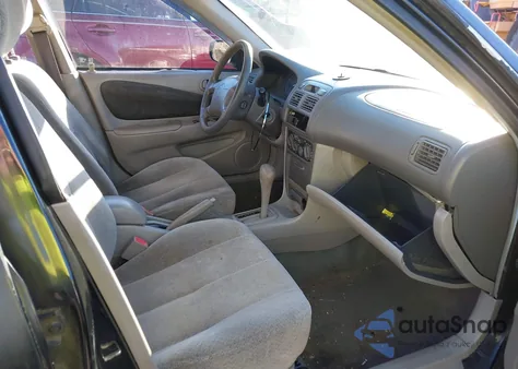 2000 Toyota Corolla Ce z USA, uszkodzony, nr VIN 1NXBR12E1YZ322000